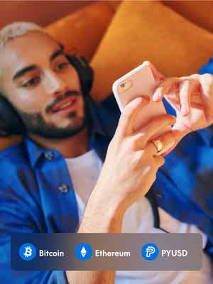 Man laying down looking at his phone